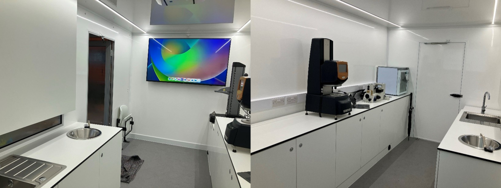 The inside of a van is shown, with various pieces of lab equipment sitting on benches.